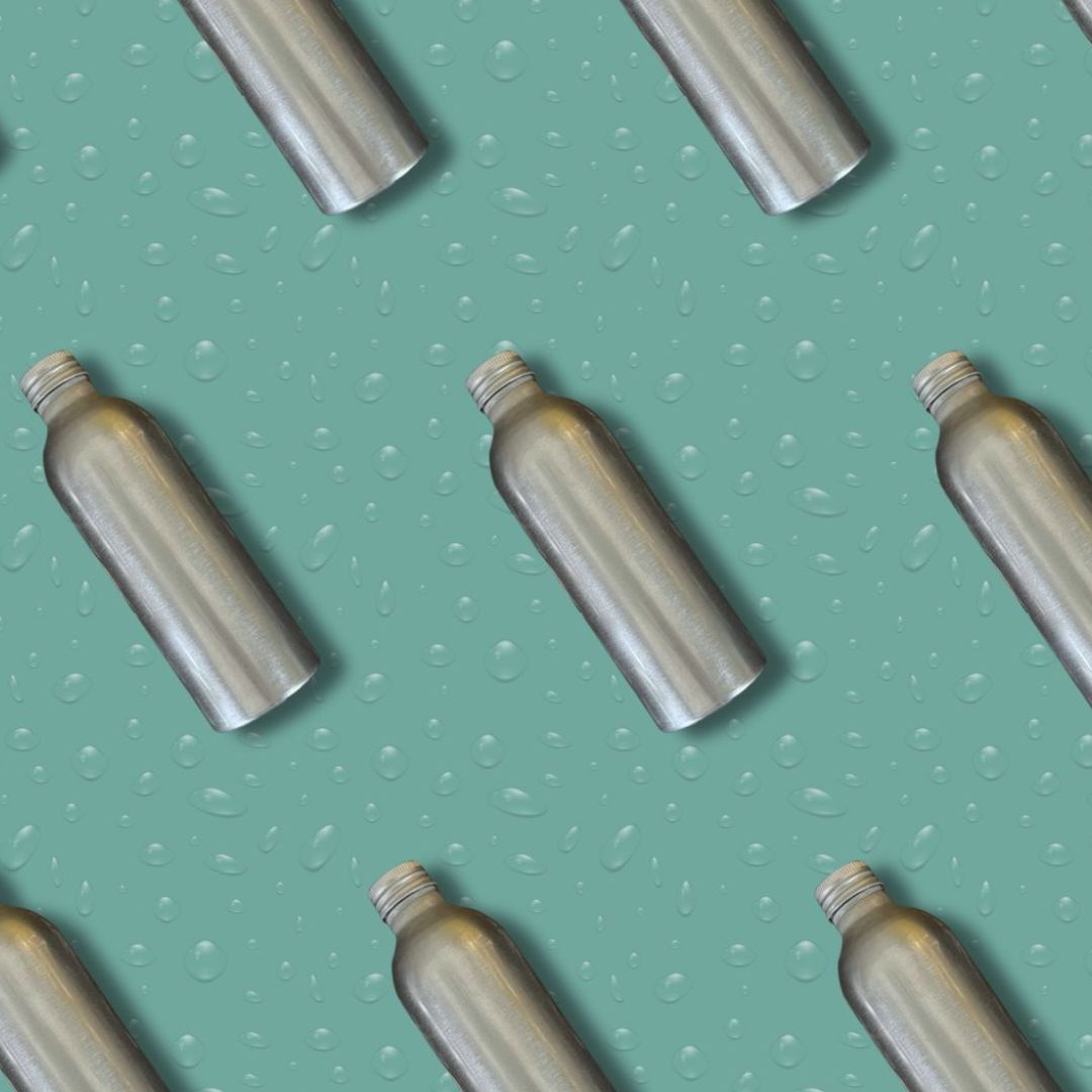Aluminium refill bottles in a pattern on turquoise background