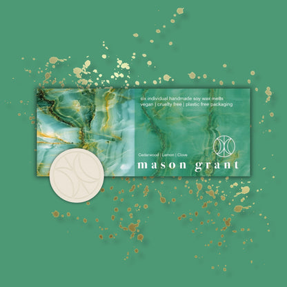 'Mason Grant' Cedarwood, Lemon and Clove Wax Melts on green background