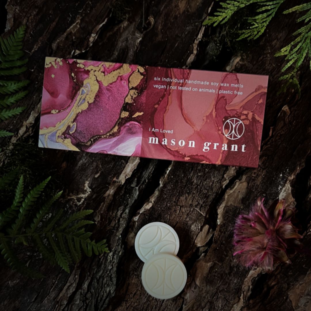 'Mason Grant' Cherry, Patchouli and Tonka Bean Wax Melts on wood background