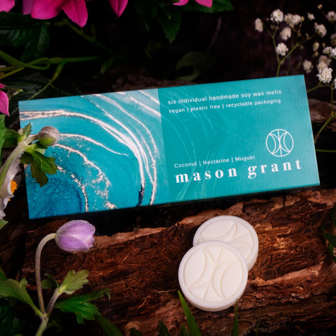 'Mason Grant' Coconut, Nectarine and Muguet Wax Melts on wood background