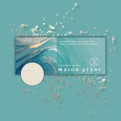 'Mason Grant' Coconut, Nectarine and Muguet Wax Melts on blue background