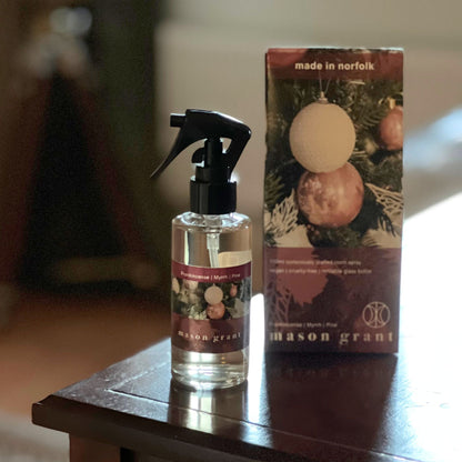 'Mason Grant' Frankincense, Myrrh and Pine Room Spray bottle and box on wooden table top