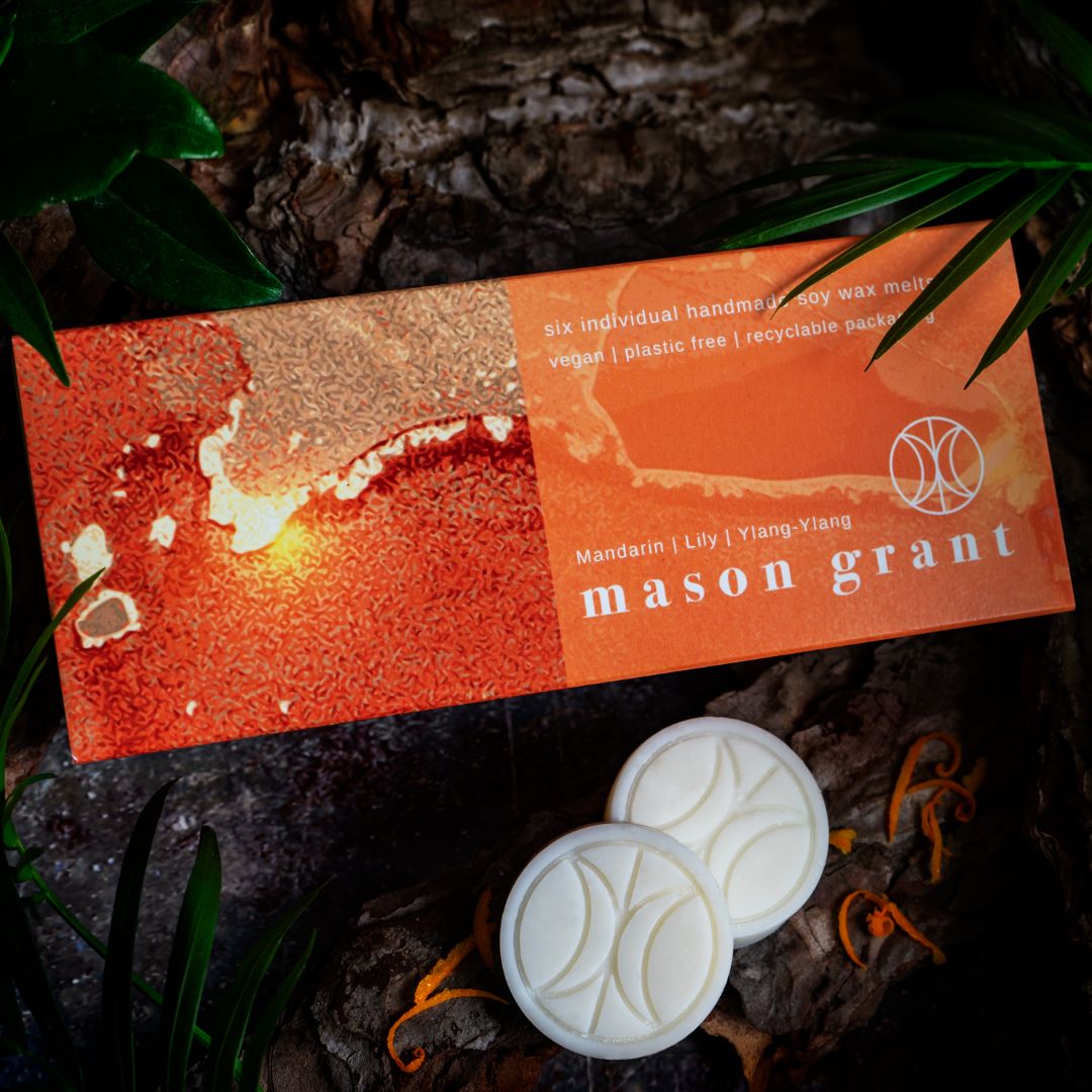 'Mason Grant' Mandarin, Lily and Ylang Ylang Wax Melts on wood background