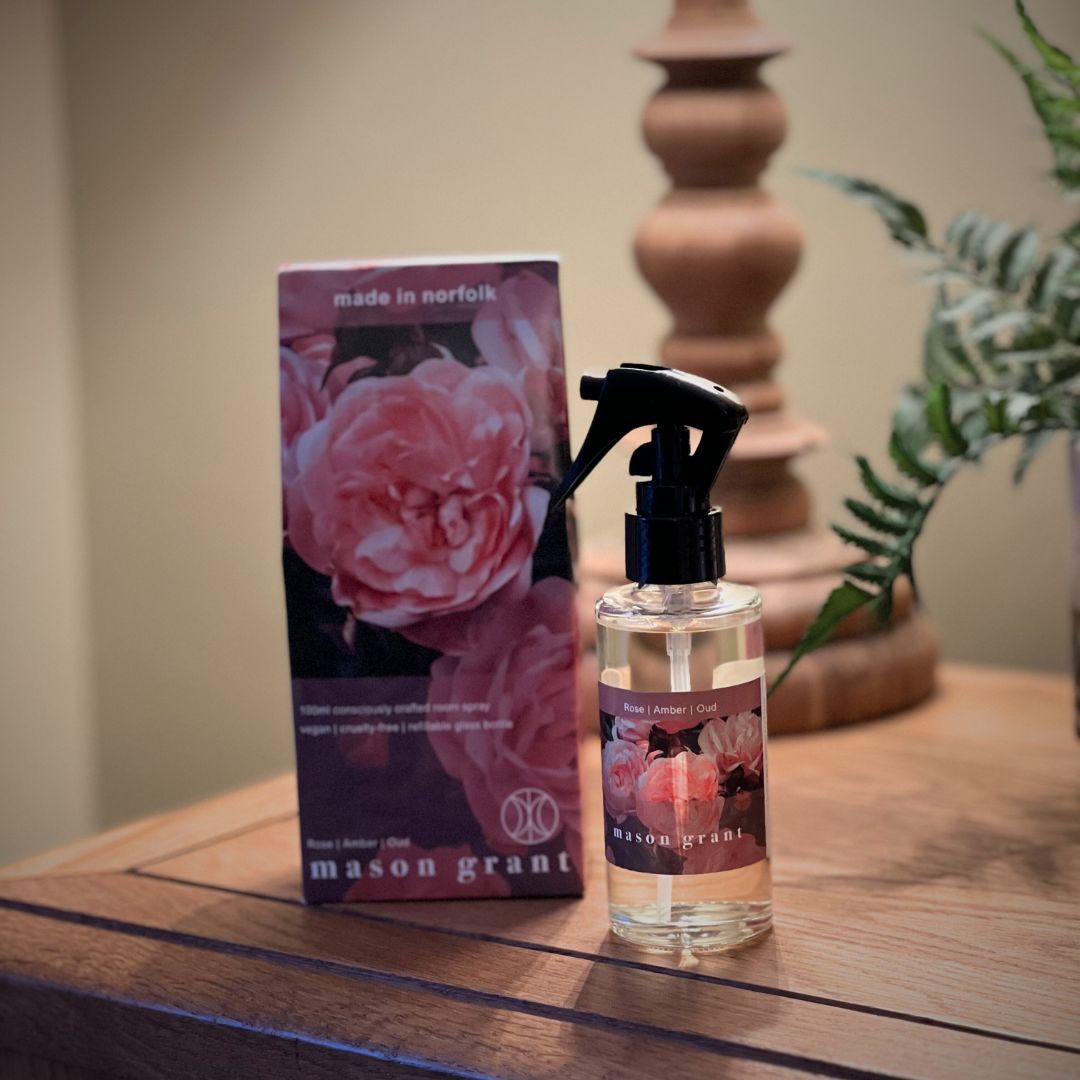 Mason Grant Rose, Amber and Oud Room Spray on wooden surface