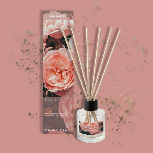 'Mason Grant' Rose, Amber and Oud Reed Diffuser on light pink background
