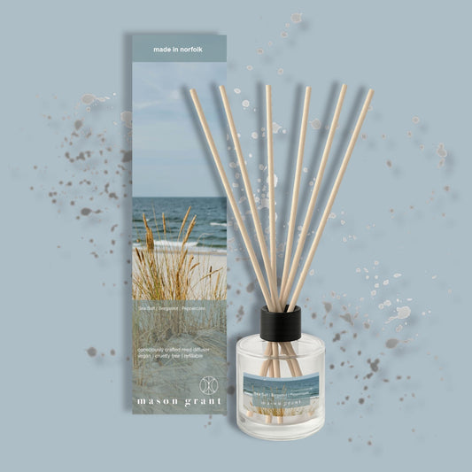 Mason Grant reed diffuser with packaging on a light blue background