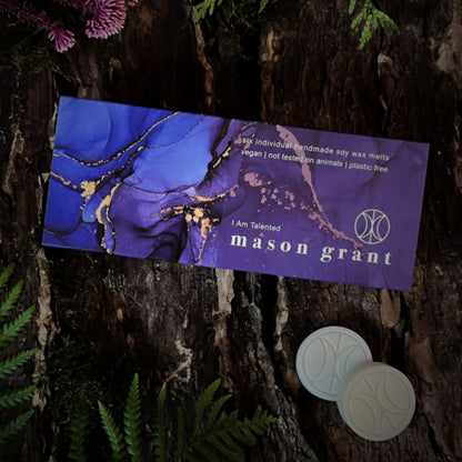 'Mason Grant' Violet, Geranium and Vetiver Wax Melts on wood background
