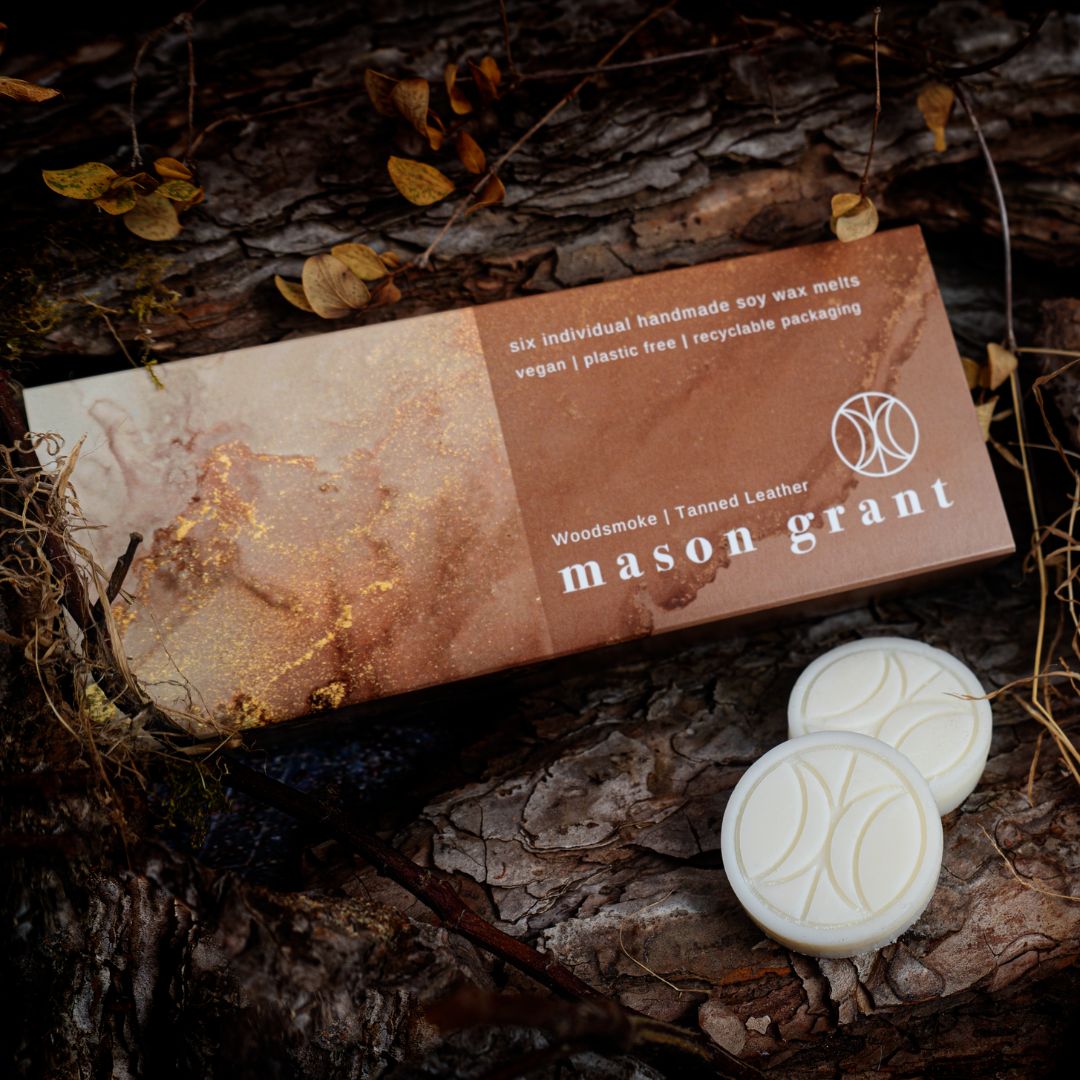 'Mason Grant' Woodsmoke and Tanned Leather Wax Melts on wood background